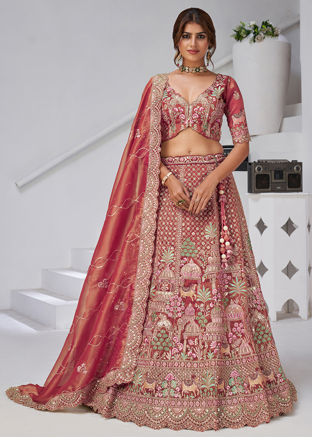 Buy Now Pink Temple & Cow Motifs Bridal Lehenga Choli Online in US, UK, Canada, France, Italy, Germany, Sweden, Denmark, Greece, Ireland & Worldwide at Empress.