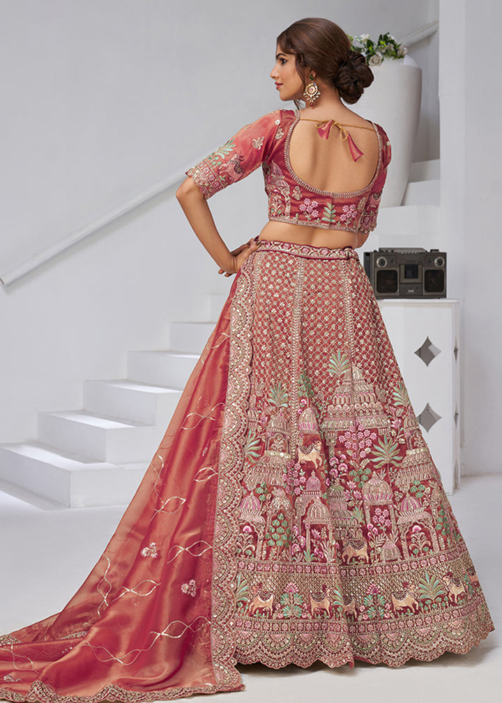 Buy Now Pink Temple & Cow Motifs Bridal Lehenga Choli Online in US, UK, Canada, France, Italy, Germany, Sweden, Denmark, Greece, Ireland & Worldwide at Empress.
