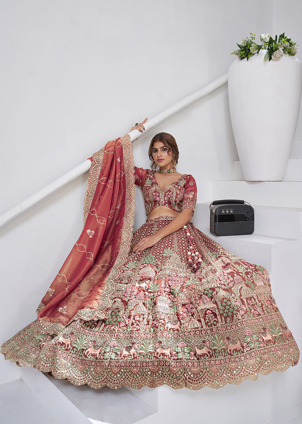 Buy Now Pink Temple & Cow Motifs Bridal Lehenga Choli Online in US, UK, Canada, France, Italy, Germany, Sweden, Denmark, Greece, Ireland & Worldwide at Empress.