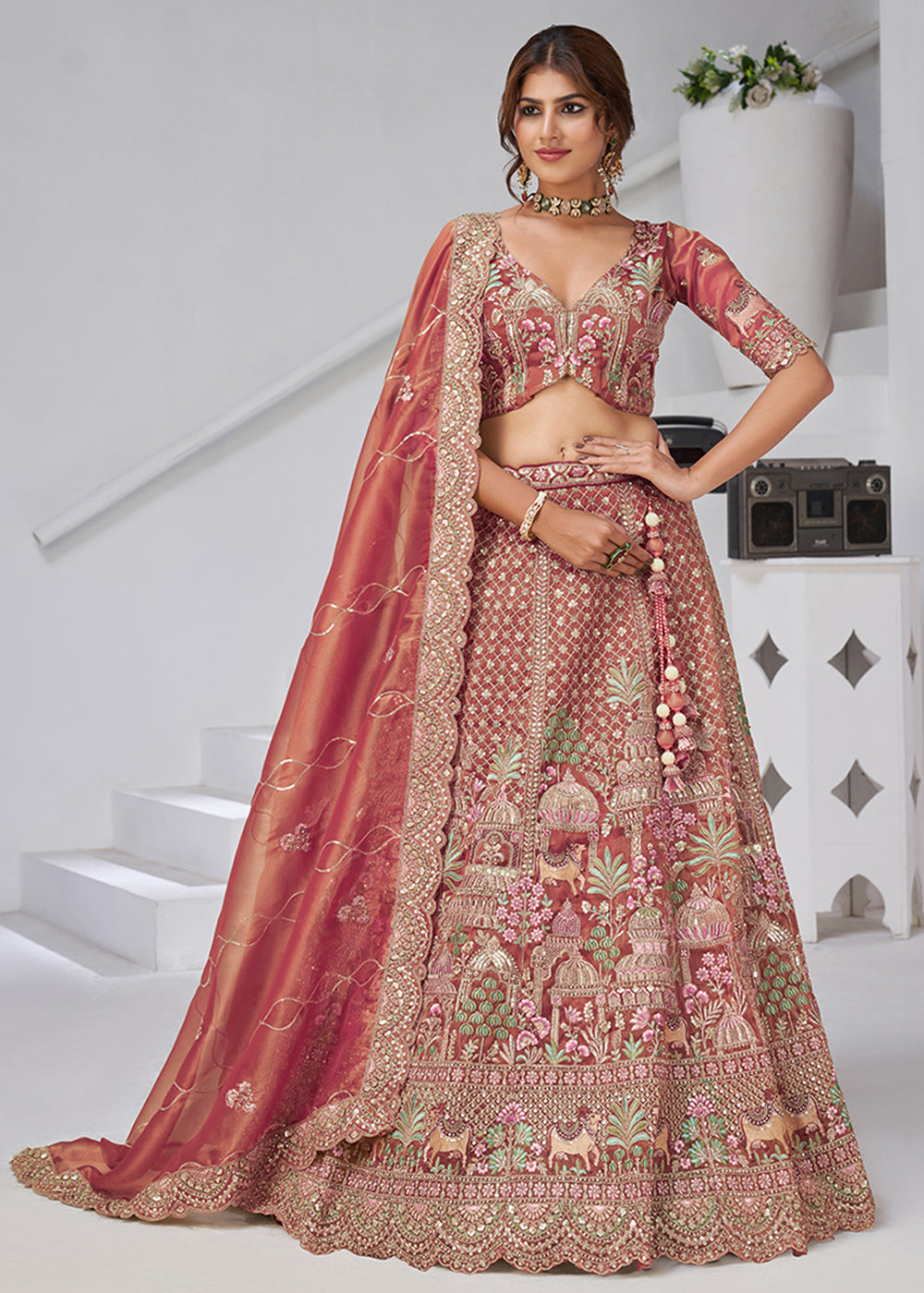 Buy Now Pink Temple & Cow Motifs Bridal Lehenga Choli Online in US, UK, Canada, France, Italy, Germany, Sweden, Denmark, Greece, Ireland & Worldwide at Empress.