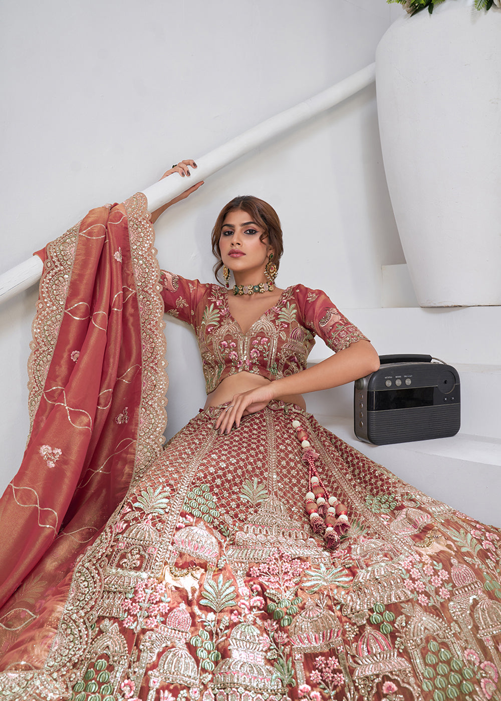 Buy Now Pink Temple & Cow Motifs Bridal Lehenga Choli Online in US, UK, Canada, France, Italy, Germany, Sweden, Denmark, Greece, Ireland & Worldwide at Empress.