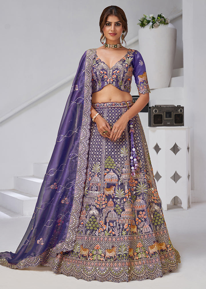 Buy Now Purple Temple & Cow Motifs Bridal Lehenga Choli Online in US, UK, Canada, France, Germany, Sweden, Denmark, Greece, Ireland & Worldwide at Empress.