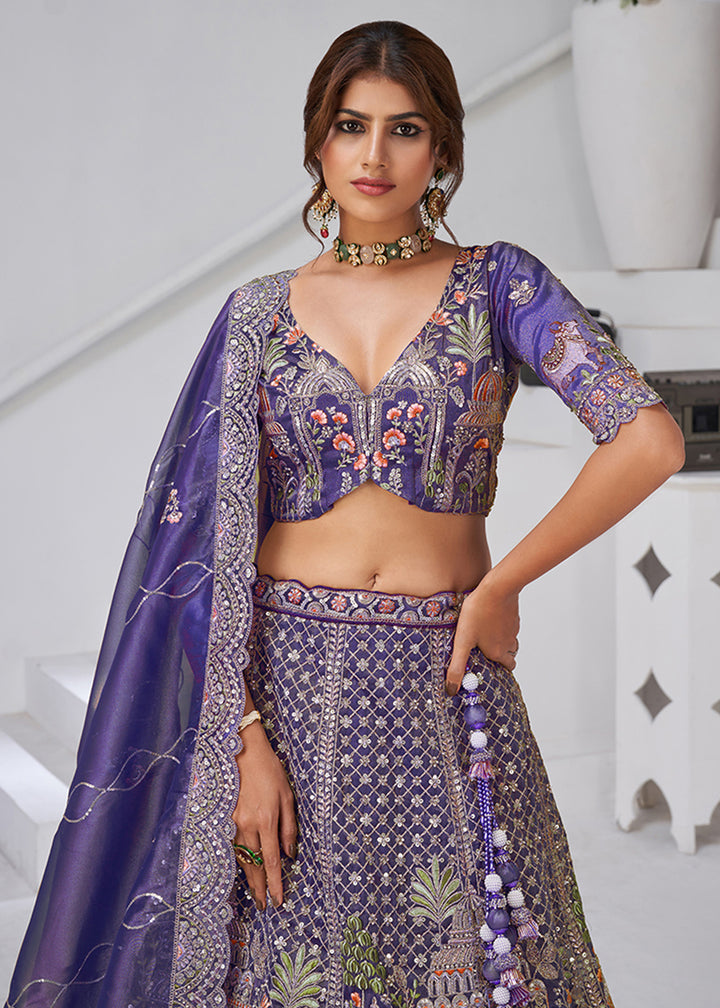 Buy Now Purple Temple & Cow Motifs Bridal Lehenga Choli Online in US, UK, Canada, France, Germany, Sweden, Denmark, Greece, Ireland & Worldwide at Empress.
