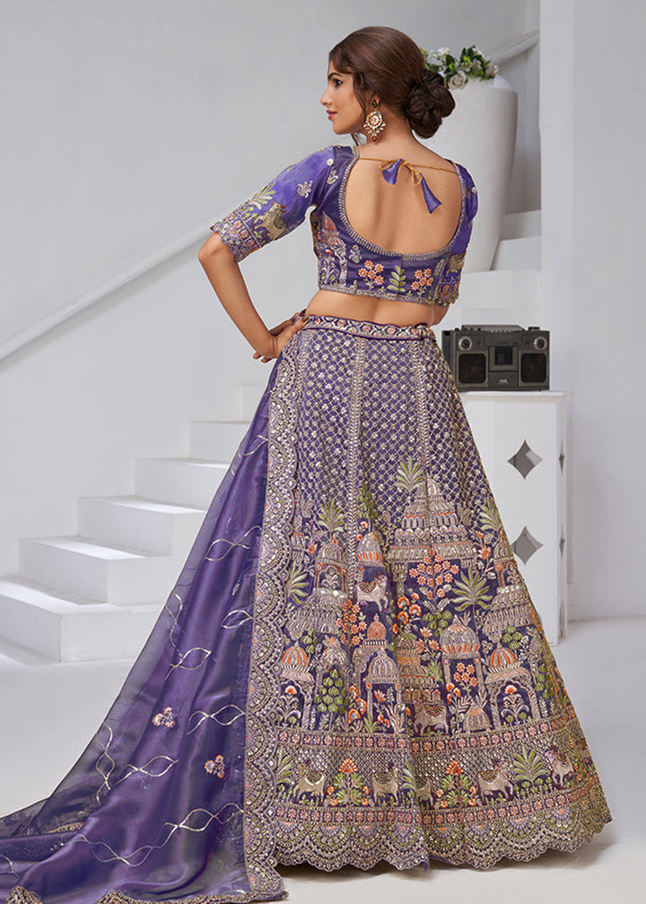 Buy Now Purple Temple & Cow Motifs Bridal Lehenga Choli Online in US, UK, Canada, France, Germany, Sweden, Denmark, Greece, Ireland & Worldwide at Empress.