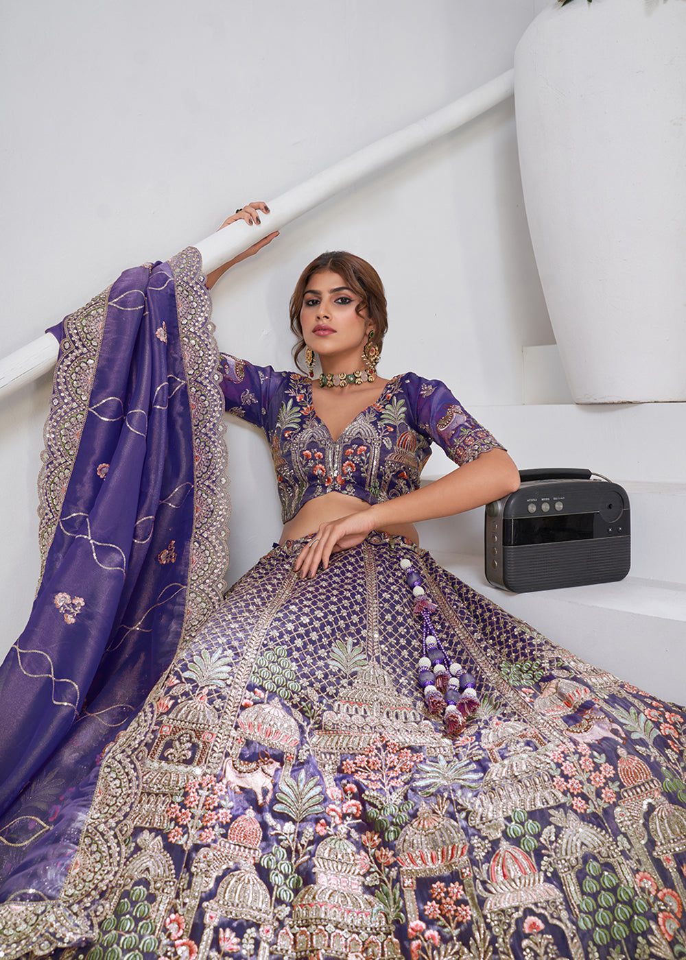 Buy Now Purple Temple & Cow Motifs Bridal Lehenga Choli Online in US, UK, Canada, France, Germany, Sweden, Denmark, Greece, Ireland & Worldwide at Empress.