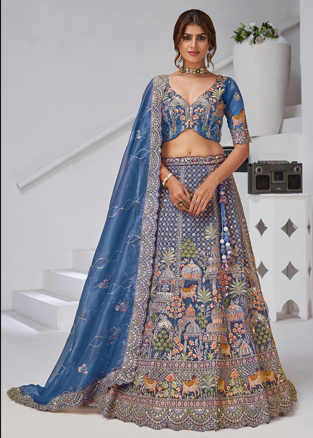 Buy Now Teal Blue Temple & Cow Motifs Bridal Lehenga Choli Online in US, UK, Canada, France, Germany, Sweden, Denmark, Greece, Ireland & Worldwide at Empress.