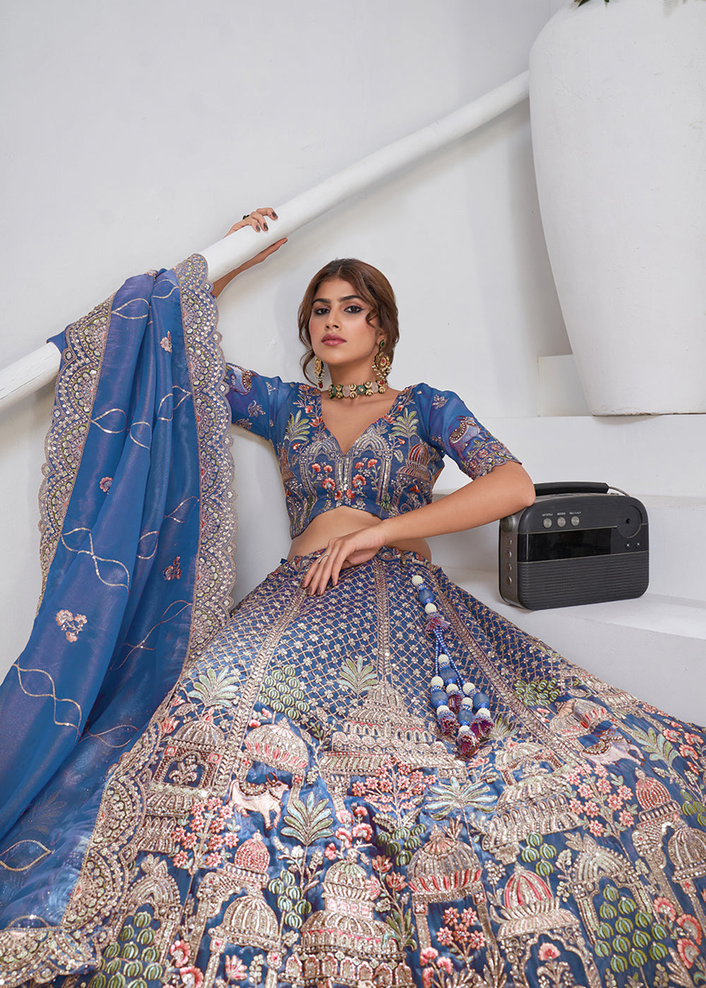 Buy Now Teal Blue Temple & Cow Motifs Bridal Lehenga Choli Online in US, UK, Canada, France, Germany, Sweden, Denmark, Greece, Ireland & Worldwide at Empress.