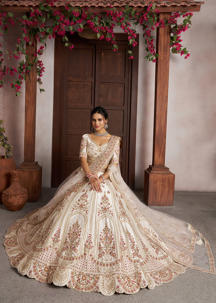 Buy Now Cream bridal Lehenga with Double Dupatta &amp; Multicolor Embroidery Online in US, UK, Canada, France, Italy, Greece, Sweden, UAE &amp; Worldwide at Empress.