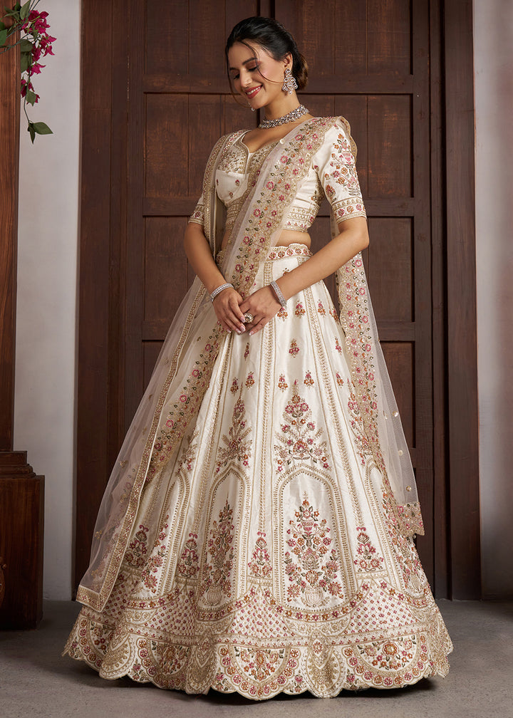 Buy Now Cream bridal Lehenga with Double Dupatta &amp; Multicolor Embroidery Online in US, UK, Canada, France, Italy, Greece, Sweden, UAE &amp; Worldwide at Empress.