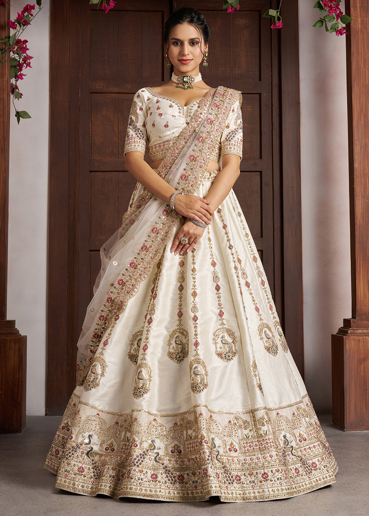 Buy Now Luxurious White Lehenga with Elegant Thread &amp; Peacock Design Online in US, UK, Canada, France, Italy, Greece, Sweden, Denmark &amp; Worldwide at Empress.