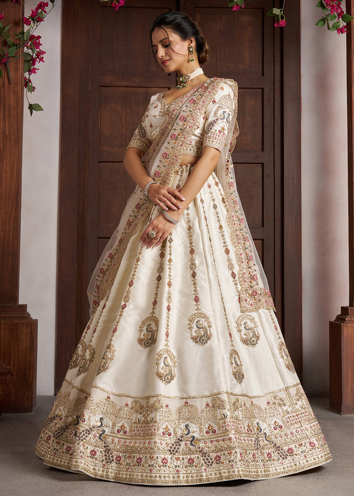 Buy Now Luxurious White Lehenga with Elegant Thread &amp; Peacock Design Online in US, UK, Canada, France, Italy, Greece, Sweden, Denmark &amp; Worldwide at Empress.