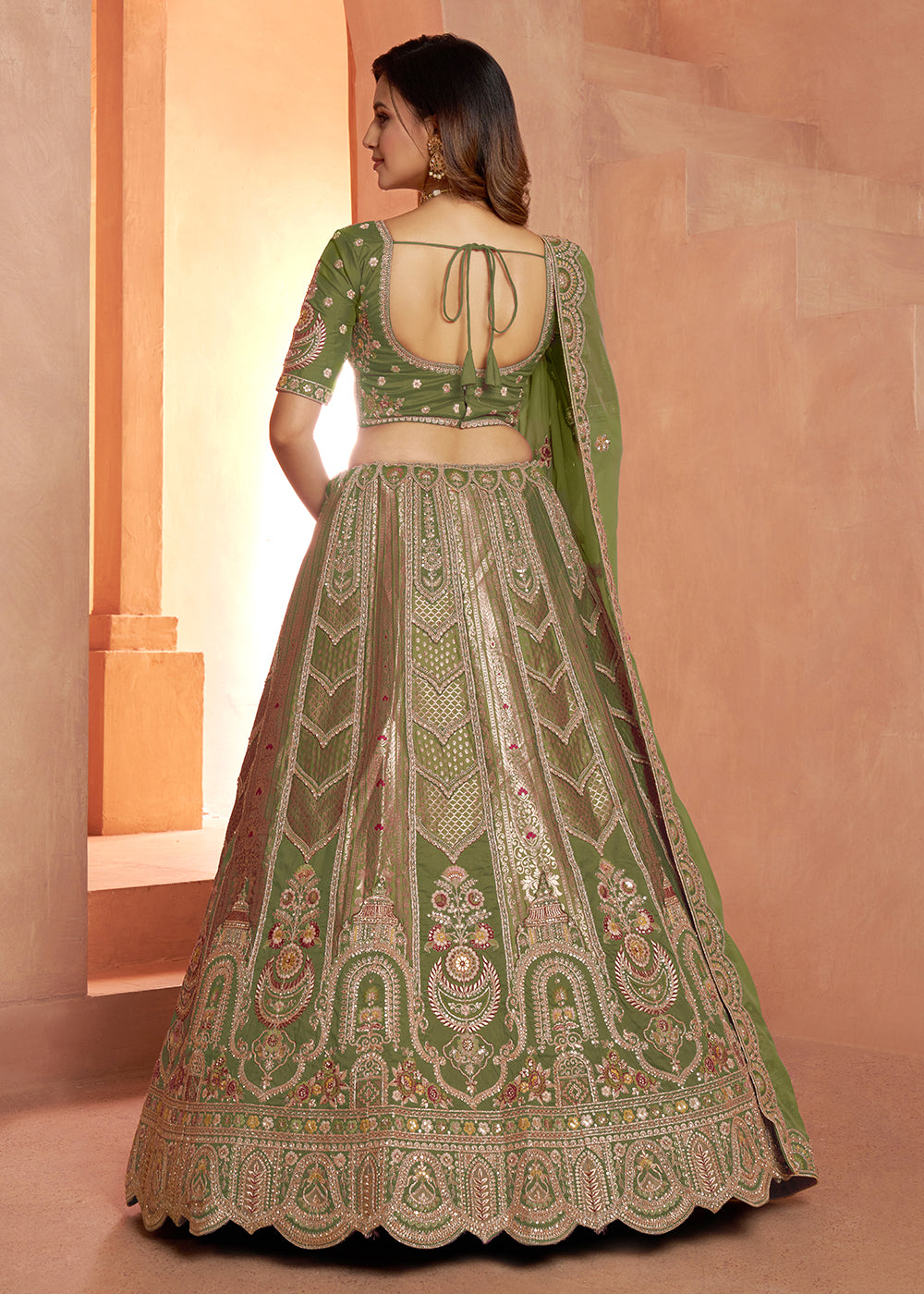 Buy Now Classic Green Silk Bridal Lehenga with Floral Zari Embroidery Online in US, UK, Canada, France, Italy, Greece, Sweden, Denmark &amp; Worldwide at Empress.
