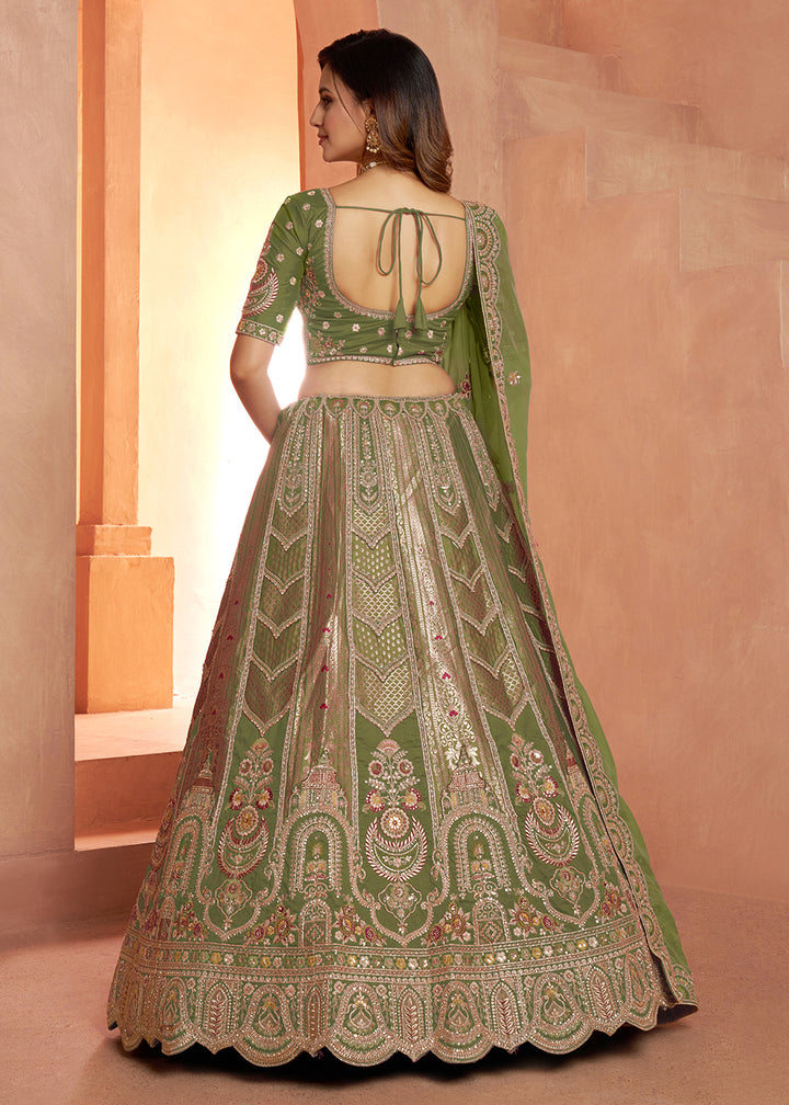 Buy Now Classic Green Silk Bridal Lehenga with Floral Zari Embroidery Online in US, UK, Canada, France, Italy, Greece, Sweden, Denmark &amp; Worldwide at Empress.