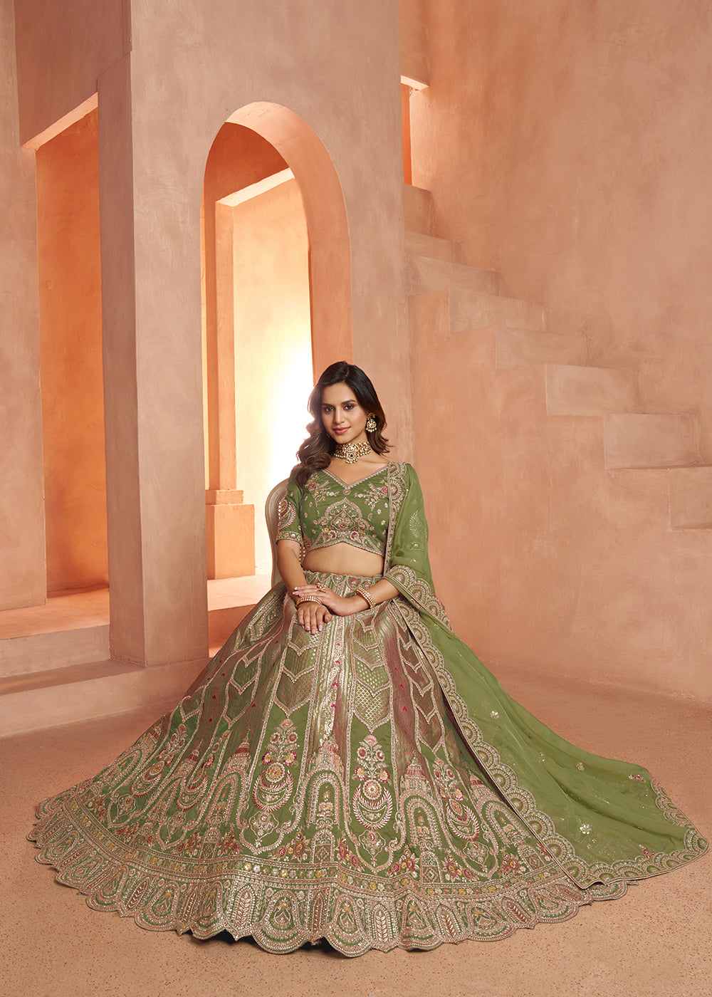 Buy Now Classic Green Silk Bridal Lehenga with Floral Zari Embroidery Online in US, UK, Canada, France, Italy, Greece, Sweden, Denmark &amp; Worldwide at Empress.