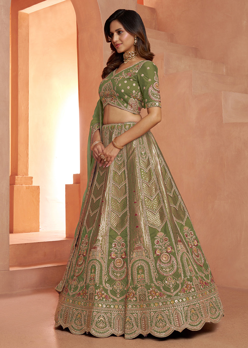 Buy Now Classic Green Silk Bridal Lehenga with Floral Zari Embroidery Online in US, UK, Canada, France, Italy, Greece, Sweden, Denmark &amp; Worldwide at Empress.