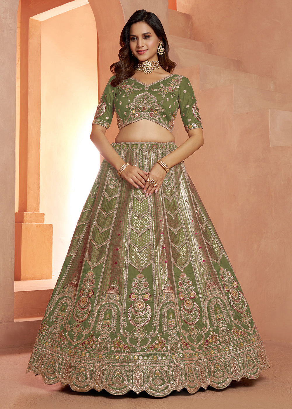 Buy Now Classic Green Silk Bridal Lehenga with Floral Zari Embroidery Online in US, UK, Canada, France, Italy, Greece, Sweden, Denmark &amp; Worldwide at Empress.