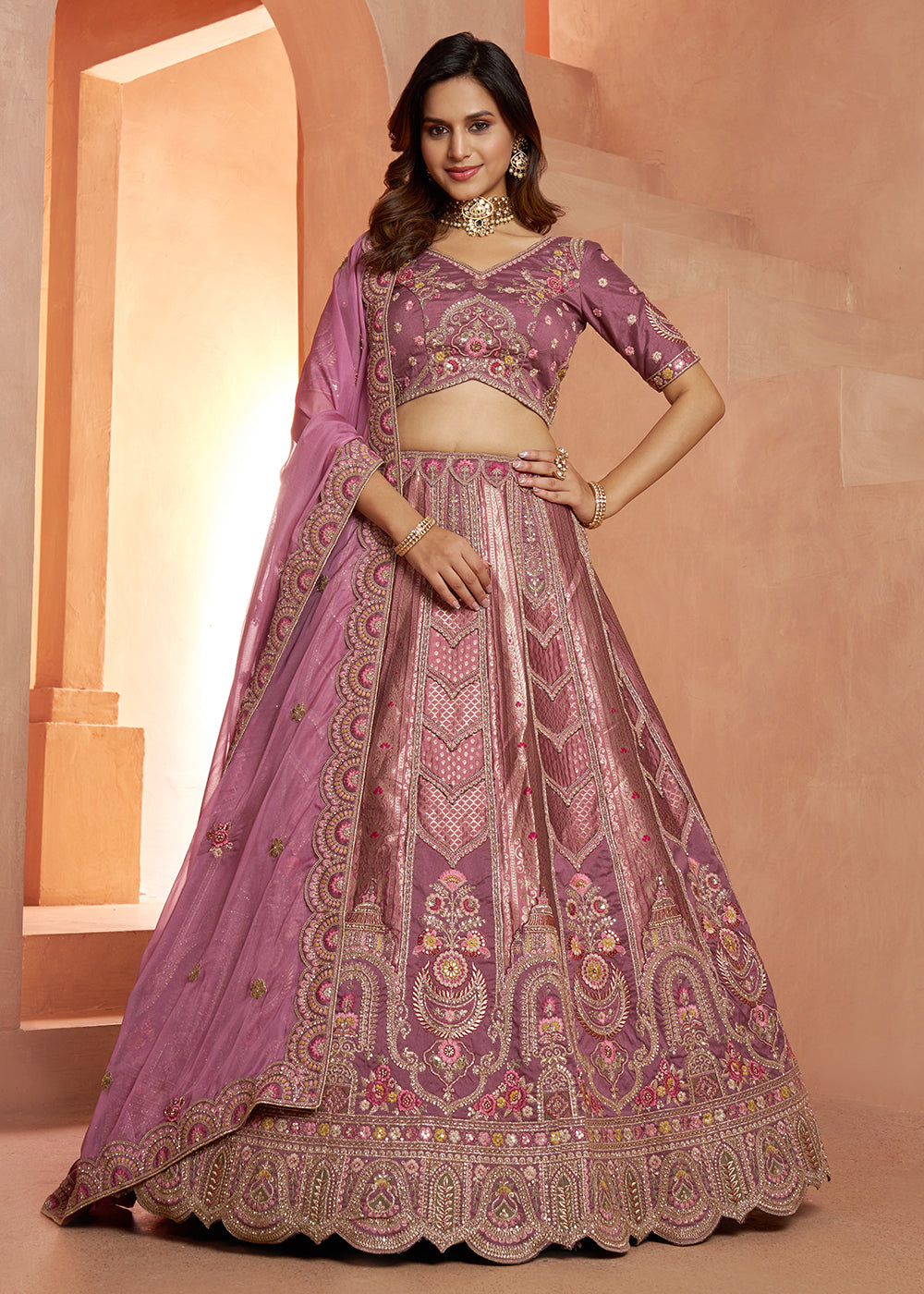 Buy Now Classic Mauve Silk Bridal Lehenga with Floral Zari Embroidery Online in US, UK, Canada, France, Italy, Greece, Sweden, Denmark & Worldwide at Empress.
