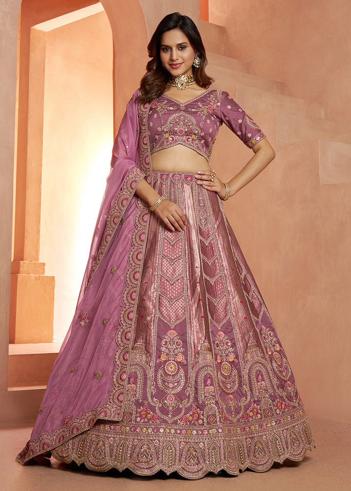 Buy Now Classic Mauve Silk Bridal Lehenga with Floral Zari Embroidery Online in US, UK, Canada, France, Italy, Greece, Sweden, Denmark &amp; Worldwide at Empress.