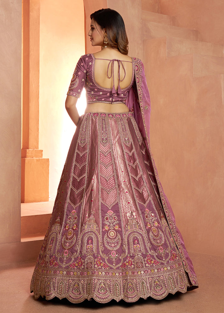 Buy Now Classic Mauve Silk Bridal Lehenga with Floral Zari Embroidery Online in US, UK, Canada, France, Italy, Greece, Sweden, Denmark &amp; Worldwide at Empress.