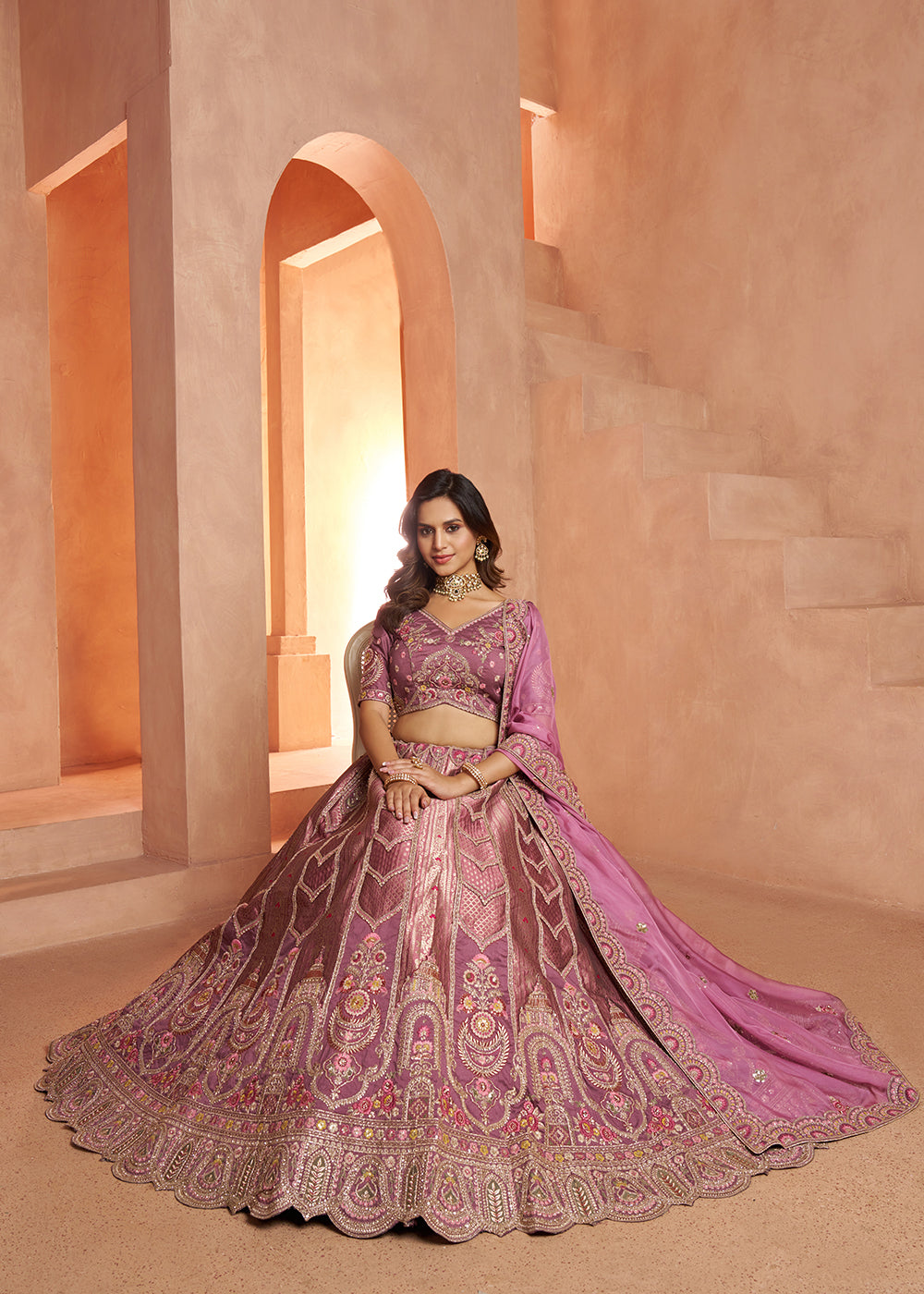 Buy Now Classic Mauve Silk Bridal Lehenga with Floral Zari Embroidery Online in US, UK, Canada, France, Italy, Greece, Sweden, Denmark &amp; Worldwide at Empress.