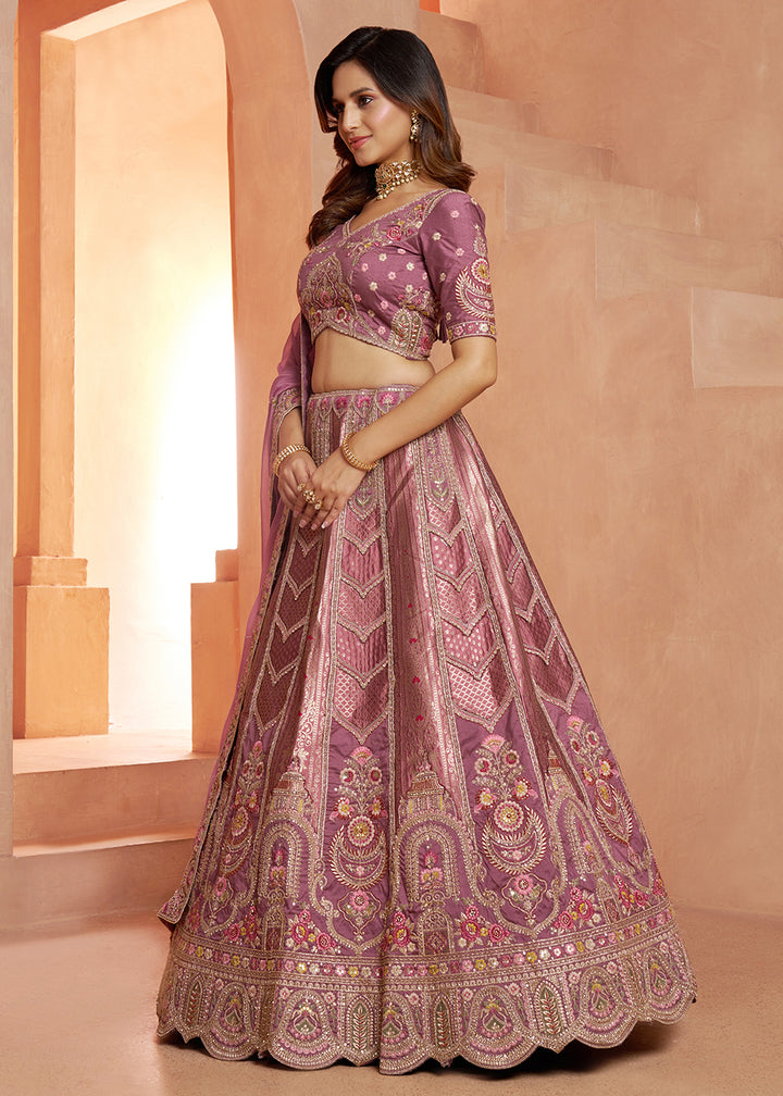 Buy Now Classic Mauve Silk Bridal Lehenga with Floral Zari Embroidery Online in US, UK, Canada, France, Italy, Greece, Sweden, Denmark &amp; Worldwide at Empress.