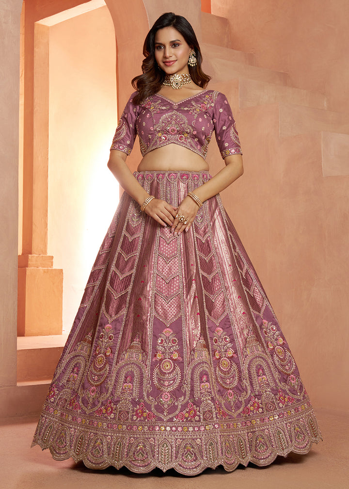 Buy Now Classic Mauve Silk Bridal Lehenga with Floral Zari Embroidery Online in US, UK, Canada, France, Italy, Greece, Sweden, Denmark &amp; Worldwide at Empress.