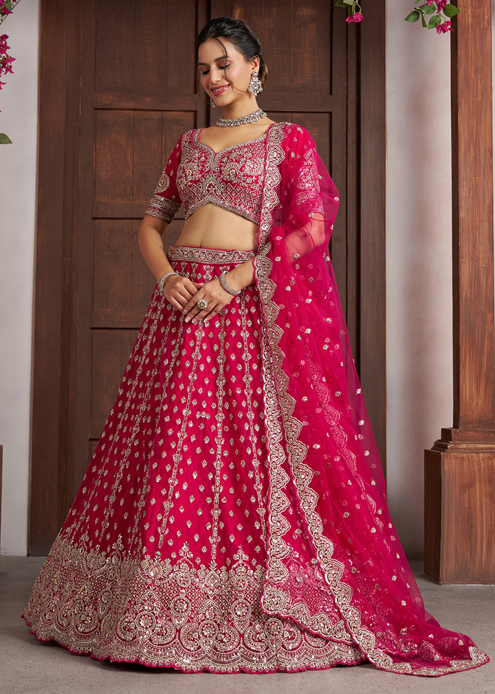 Buy Now Elegant Rani Pink Lehenga with Heavy Silver Zari &amp; Beads Detailing Online in US, UK, Canada, France, Italy, Greece, Sweden, UAE &amp; Worldwide at Empress.
