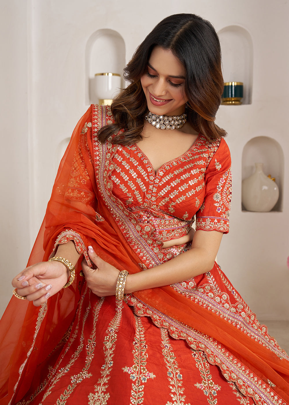 Buy Now Rust Wedding Lehenga Adorned with Floral Zari Embroidery Online in US, UK, Canada, France, Italy, Greece, Sweden, UAE, Denmark & Worldwide at Empress.