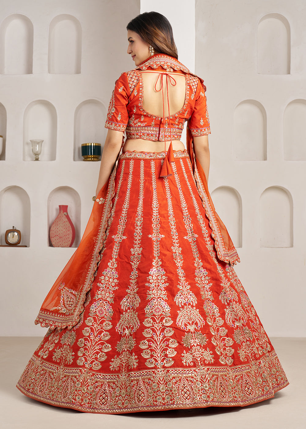 Buy Now Rust Wedding Lehenga Adorned with Floral Zari Embroidery Online in US, UK, Canada, France, Italy, Greece, Sweden, UAE, Denmark &amp; Worldwide at Empress.