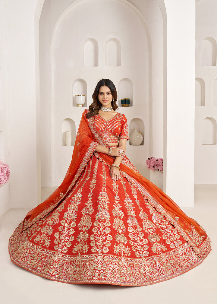 Buy Now Rust Wedding Lehenga Adorned with Floral Zari Embroidery Online in US, UK, Canada, France, Italy, Greece, Sweden, UAE, Denmark &amp; Worldwide at Empress.