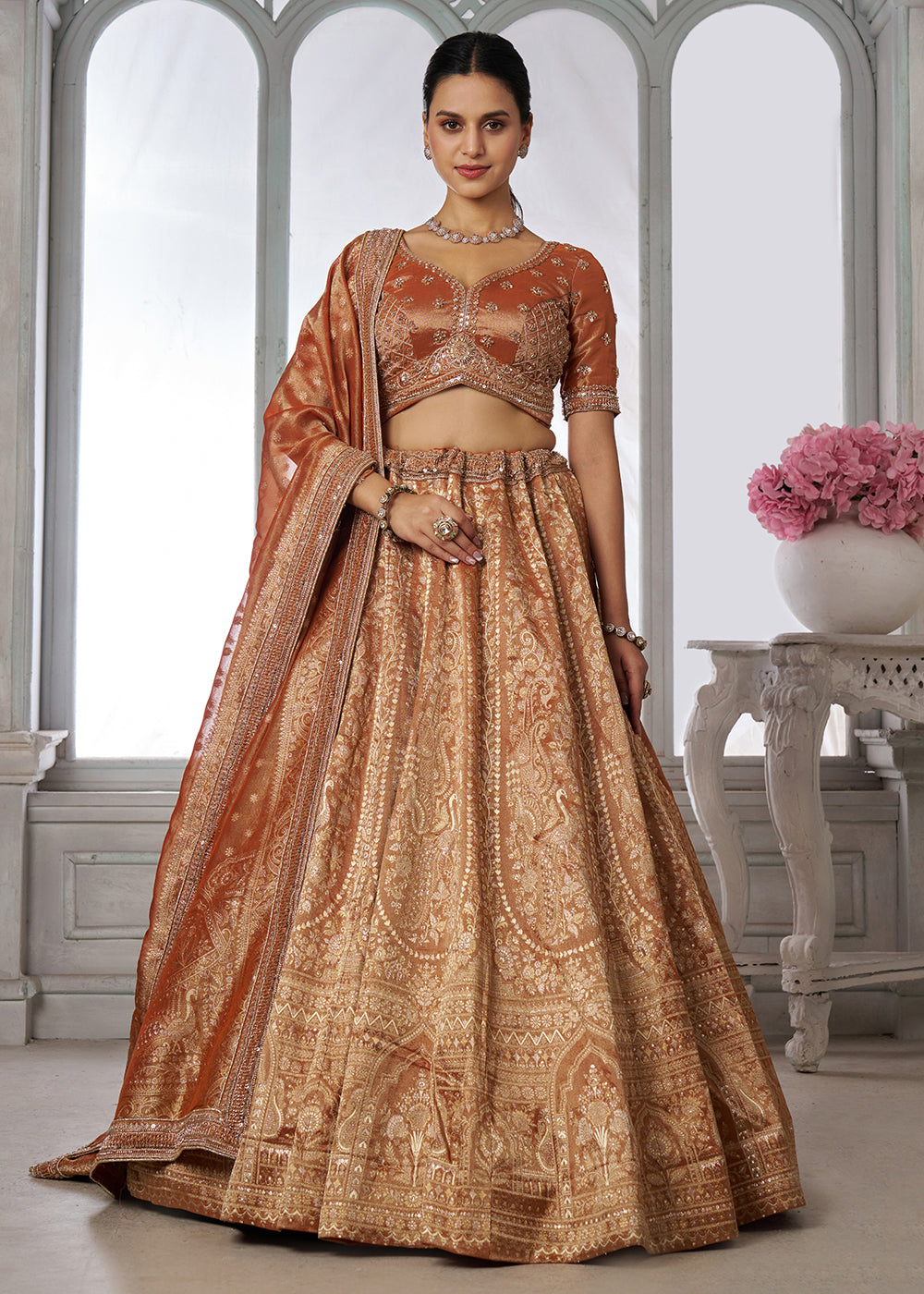 Buy Now Rust Zari Tissue Lehenga Adorned with Delicate Beadwork Online in US, UK, Canada, France, Italy, Greece, Sweden, UAE, Denmark & Worldwide at Empress.