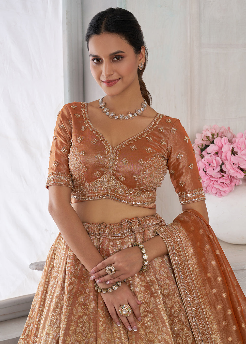 Buy Now Rust Zari Tissue Lehenga Adorned with Delicate Beadwork Online in US, UK, Canada, France, Italy, Greece, Sweden, UAE, Denmark & Worldwide at Empress.