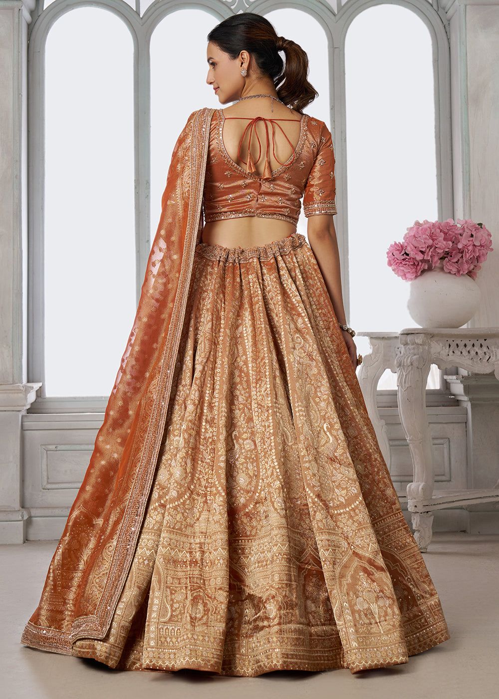 Buy Now Rust Zari Tissue Lehenga Adorned with Delicate Beadwork Online in US, UK, Canada, France, Italy, Greece, Sweden, UAE, Denmark &amp; Worldwide at Empress.
