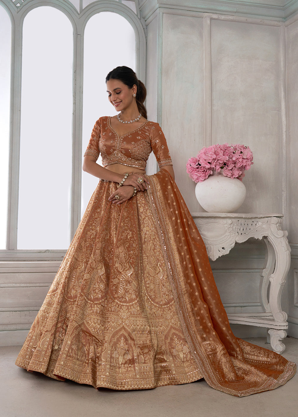 Buy Now Rust Zari Tissue Lehenga Adorned with Delicate Beadwork Online in US, UK, Canada, France, Italy, Greece, Sweden, UAE, Denmark &amp; Worldwide at Empress.