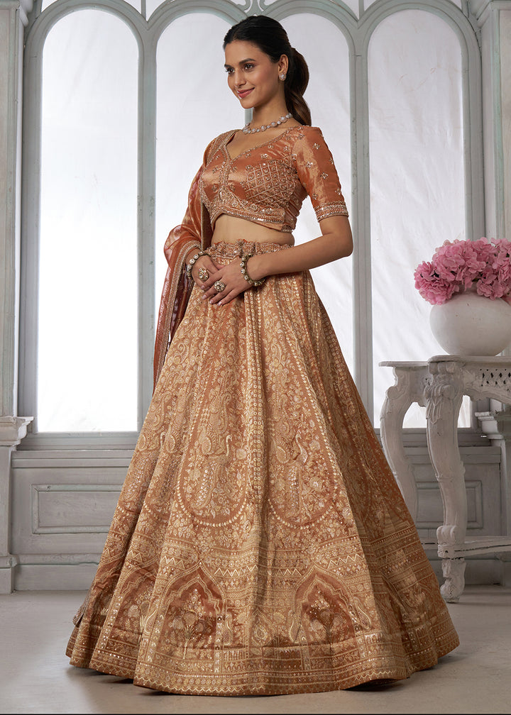 Buy Now Rust Zari Tissue Lehenga Adorned with Delicate Beadwork Online in US, UK, Canada, France, Italy, Greece, Sweden, UAE, Denmark &amp; Worldwide at Empress.