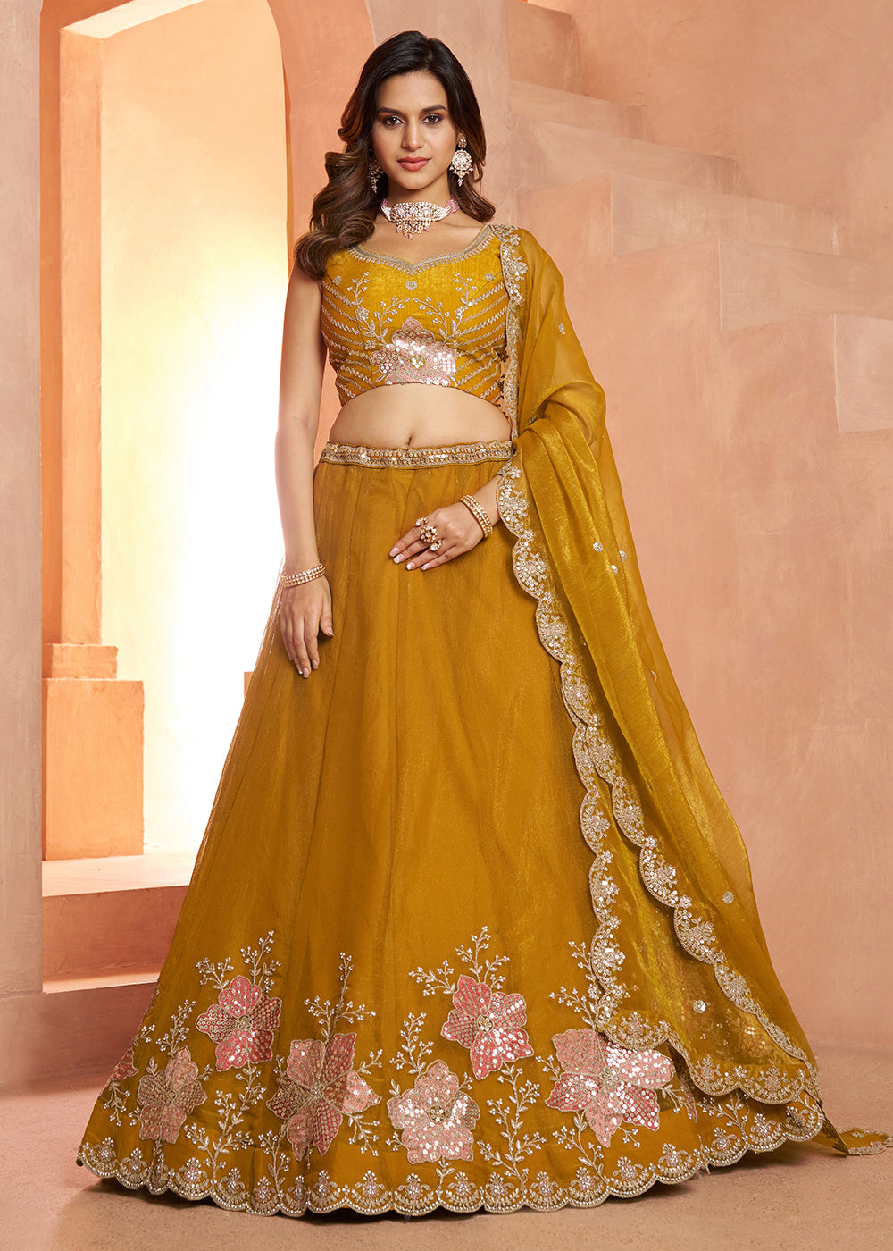 Buy Now Elegant Floral Mustard Embroidered Tissue Lehenga Choli Online in US, UK, Canada, France, Italy, Greece, Sweden, UAE, Denmark & Worldwide at Empress.