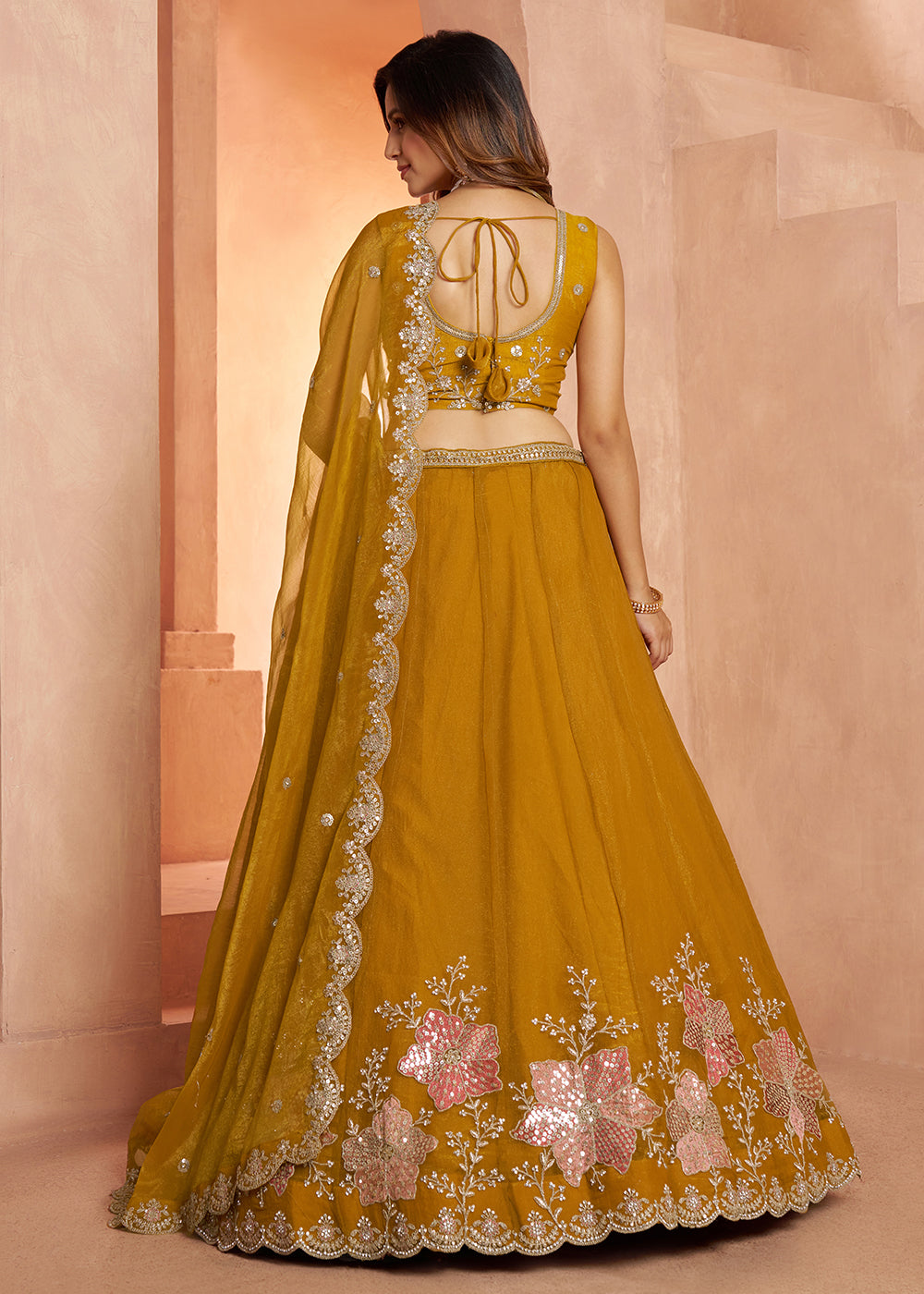 Buy Now Elegant Floral Mustard Embroidered Tissue Lehenga Choli Online in US, UK, Canada, France, Italy, Greece, Sweden, UAE, Denmark &amp; Worldwide at Empress.