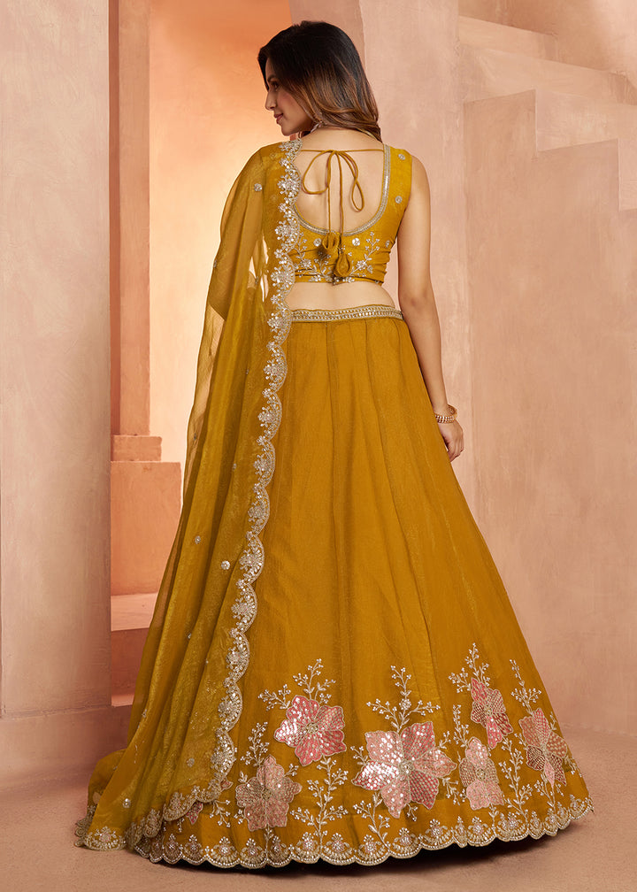 Buy Now Elegant Floral Mustard Embroidered Tissue Lehenga Choli Online in US, UK, Canada, France, Italy, Greece, Sweden, UAE, Denmark &amp; Worldwide at Empress.