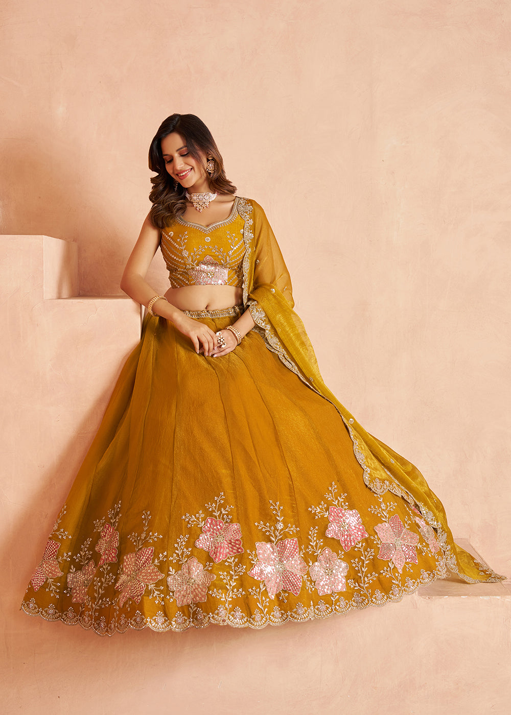 Buy Now Elegant Floral Mustard Embroidered Tissue Lehenga Choli Online in US, UK, Canada, France, Italy, Greece, Sweden, UAE, Denmark &amp; Worldwide at Empress.