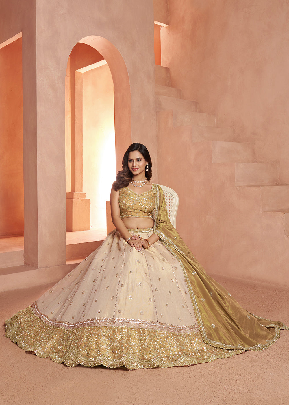 Buy Now Designer Gold Lehenga with Luxurious Embellished Details Online in US, UK, Canada, France, Italy, Greece, Sweden, UAE, Denmark &amp; Worldwide at Empress.