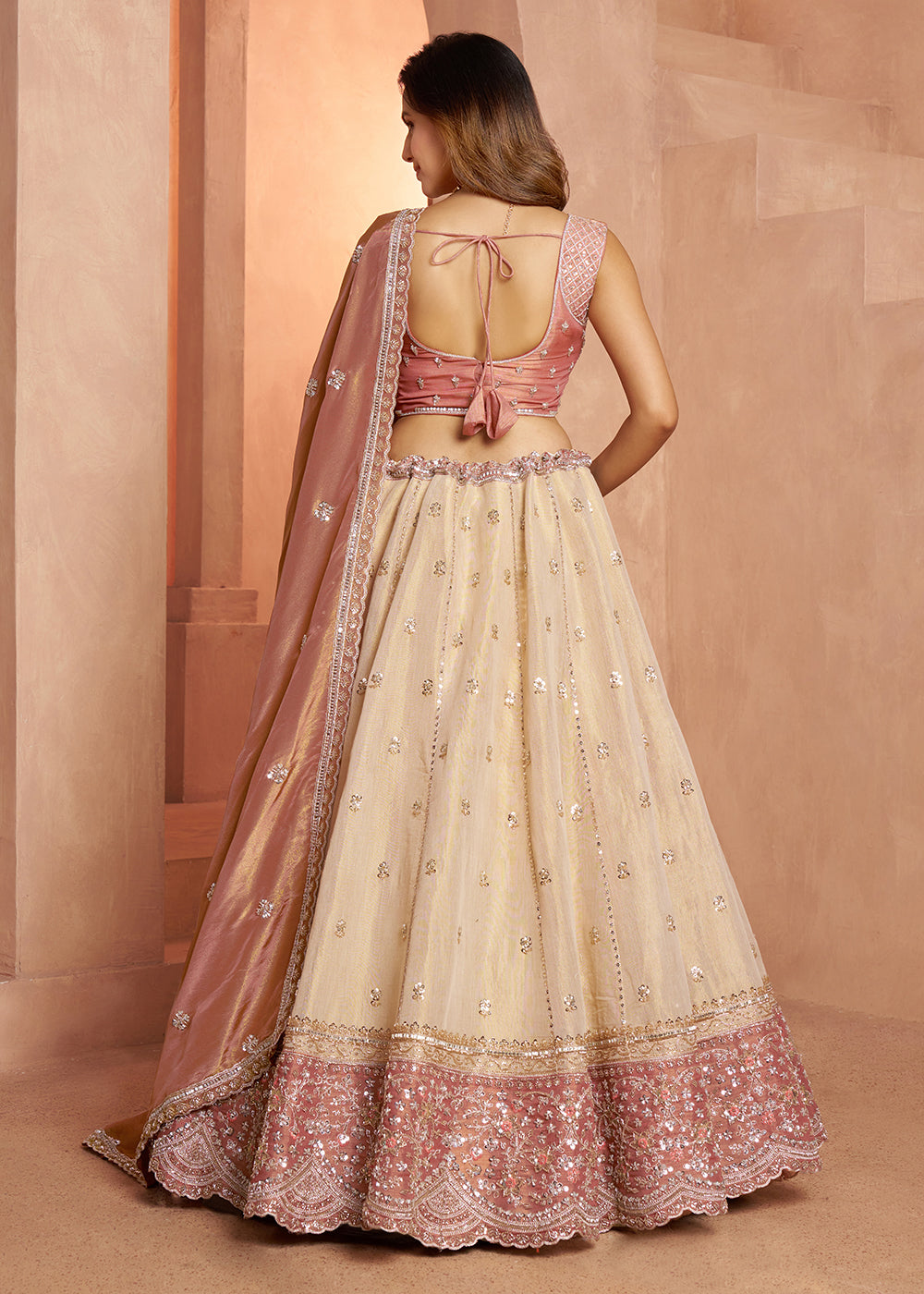 Buy Now Designer Peach  Lehenga with Luxurious Embellished Details Online in US, UK, Canada, France, Italy, Greece, Sweden, UAE, Denmark &amp; Worldwide at Empress.