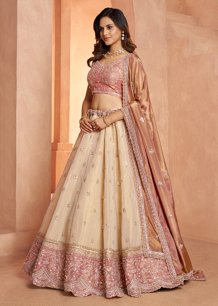 Buy Now Designer Peach  Lehenga with Luxurious Embellished Details Online in US, UK, Canada, France, Italy, Greece, Sweden, UAE, Denmark &amp; Worldwide at Empress.
