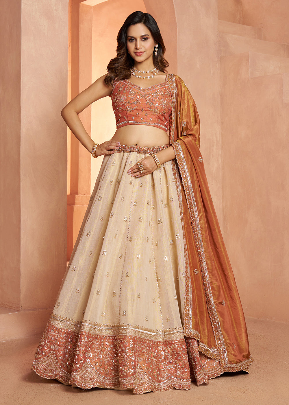 Buy Now Designer Rust Lehenga with Luxurious Embellished Details Online in US, UK, Canada, France, Italy, Greece, Sweden, UAE, Denmark & Worldwide at Empress.