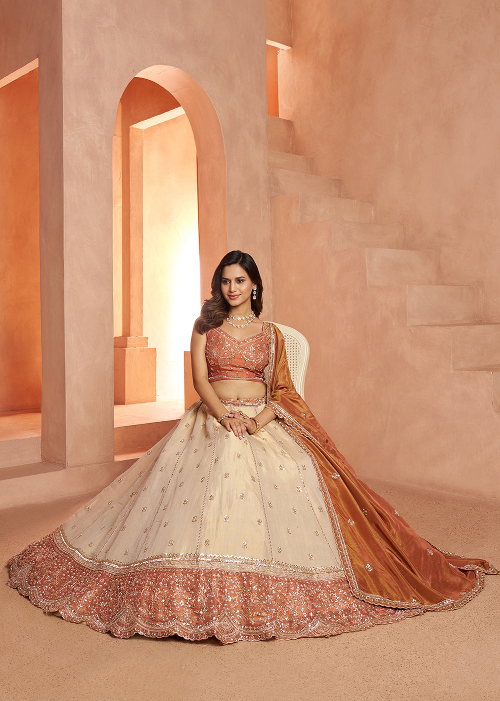 Buy Now Designer Rust Lehenga with Luxurious Embellished Details Online in US, UK, Canada, France, Italy, Greece, Sweden, UAE, Denmark &amp; Worldwide at Empress.