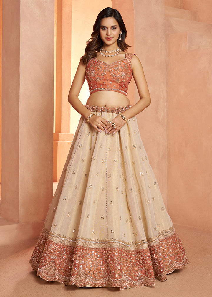 Buy Now Designer Rust Lehenga with Luxurious Embellished Details Online in US, UK, Canada, France, Italy, Greece, Sweden, UAE, Denmark &amp; Worldwide at Empress.