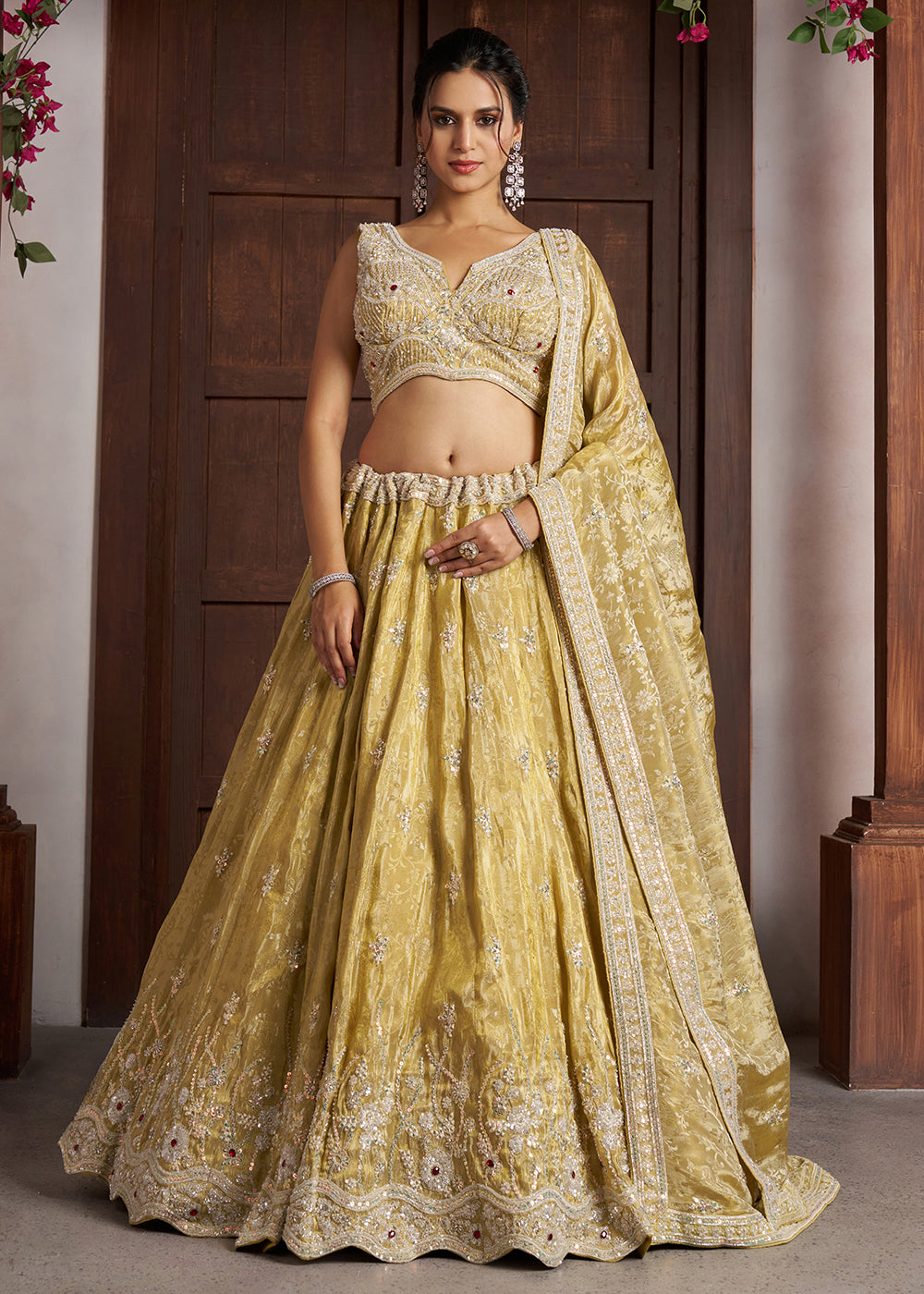Buy Now Yellow Banarasi Tissue Lehenga Adorned with Beads Embellishments Online in US, UK, Canada, France, Italy, Greece, Sweden, UAE & Worldwide at Empress.
