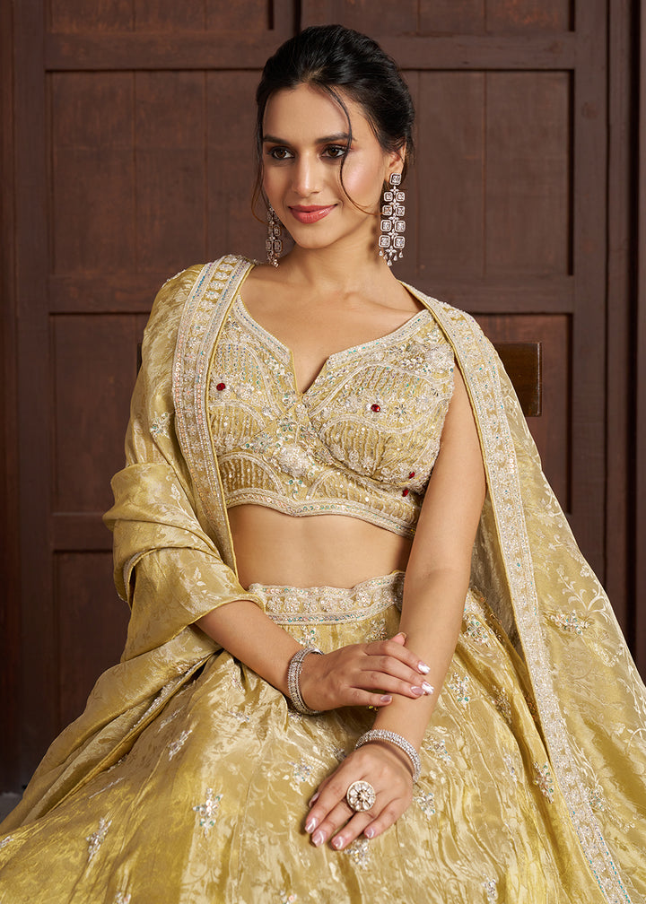 Buy Now Yellow Banarasi Tissue Lehenga Adorned with Beads Embellishments Online in US, UK, Canada, France, Italy, Greece, Sweden, UAE &amp; Worldwide at Empress.