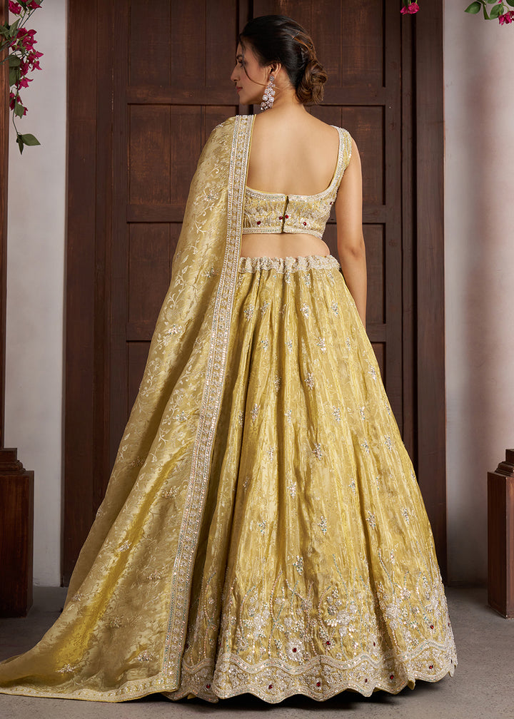 Buy Now Yellow Banarasi Tissue Lehenga Adorned with Beads Embellishments Online in US, UK, Canada, France, Italy, Greece, Sweden, UAE &amp; Worldwide at Empress.