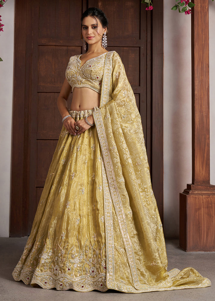 Buy Now Yellow Banarasi Tissue Lehenga Adorned with Beads Embellishments Online in US, UK, Canada, France, Italy, Greece, Sweden, UAE &amp; Worldwide at Empress.