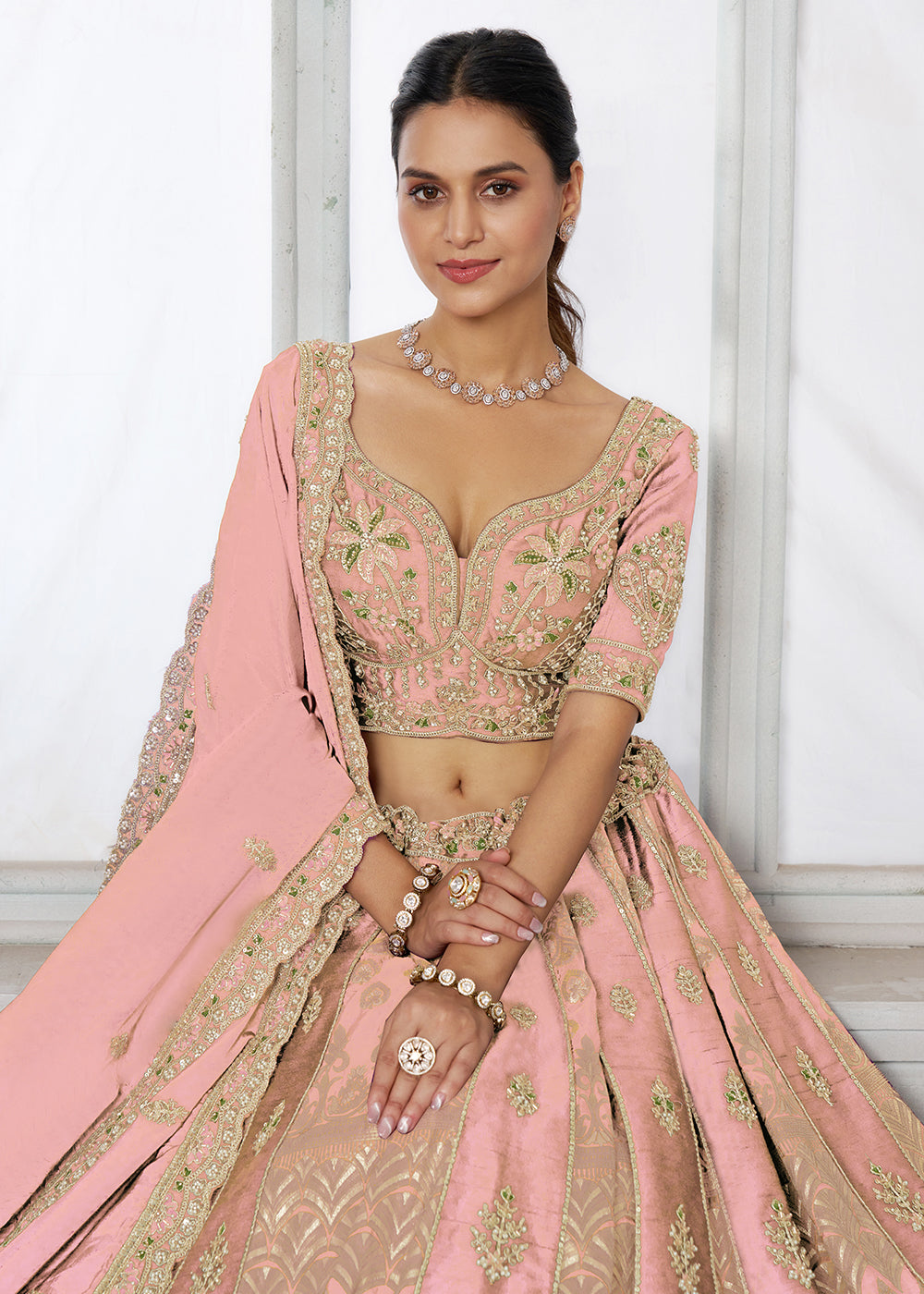 Buy Now Designer Pink Raw Silk Lehenga with Intricate Embroidered Detailing Online in US, UK, Canada, France, Italy, Greece, Sweden, UAE & Worldwide at Empress.